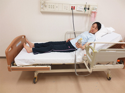 背上げを利用した起き上がり